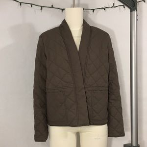 Light weight quilted jacket with drop in pockets.